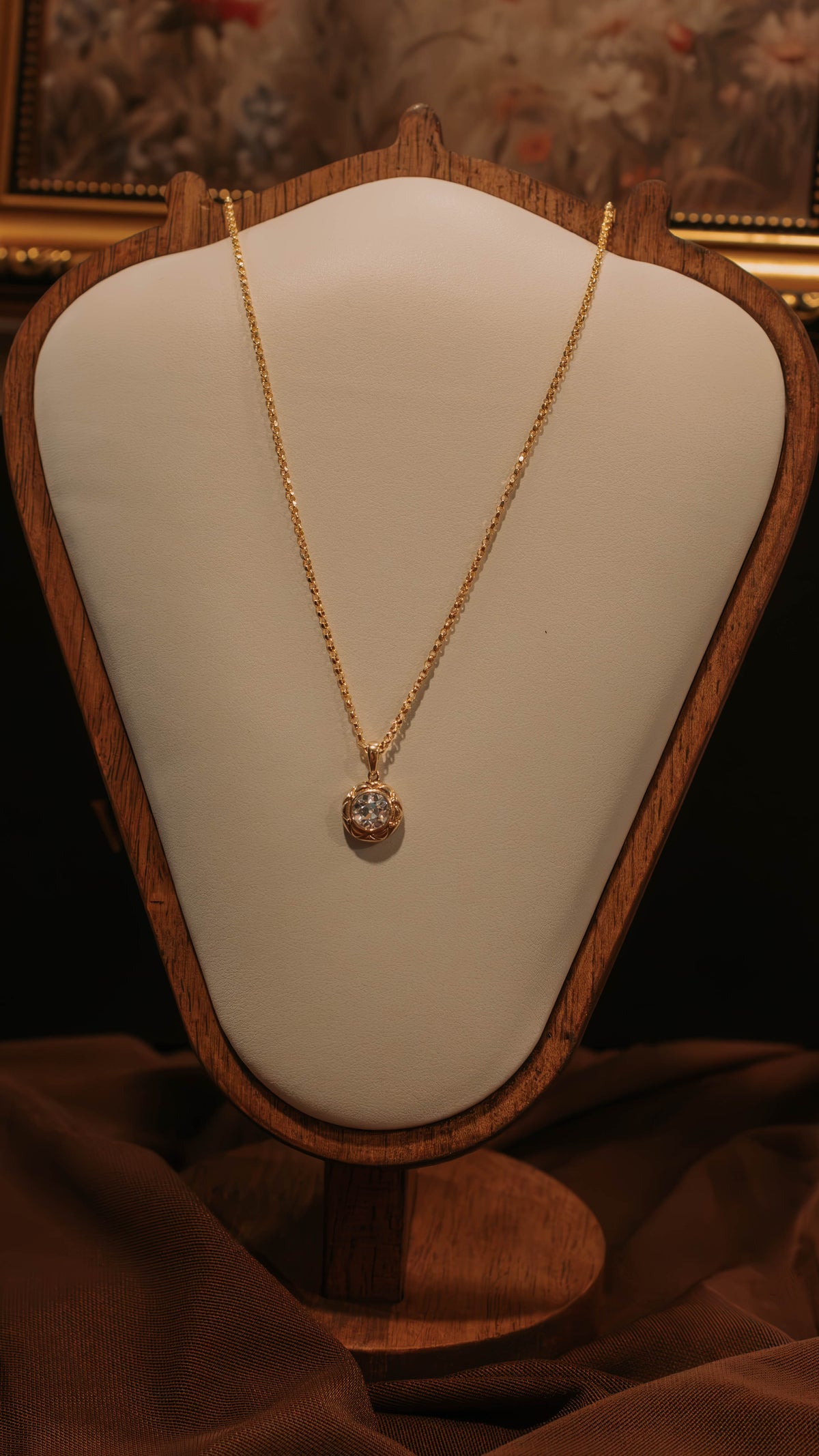Close-up of 14k gold petite rolo chain links