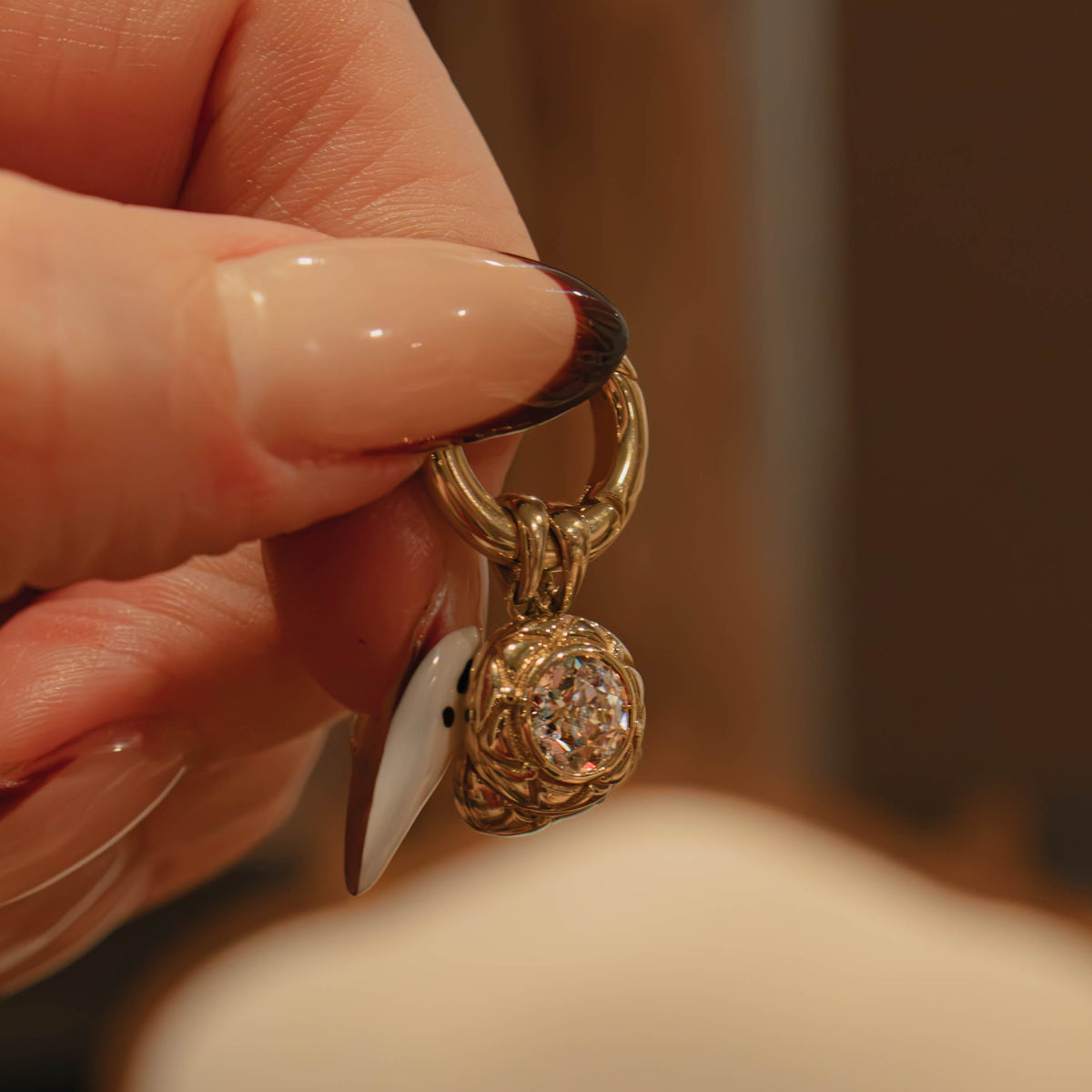 14k gold connector charm ring styled on a chain