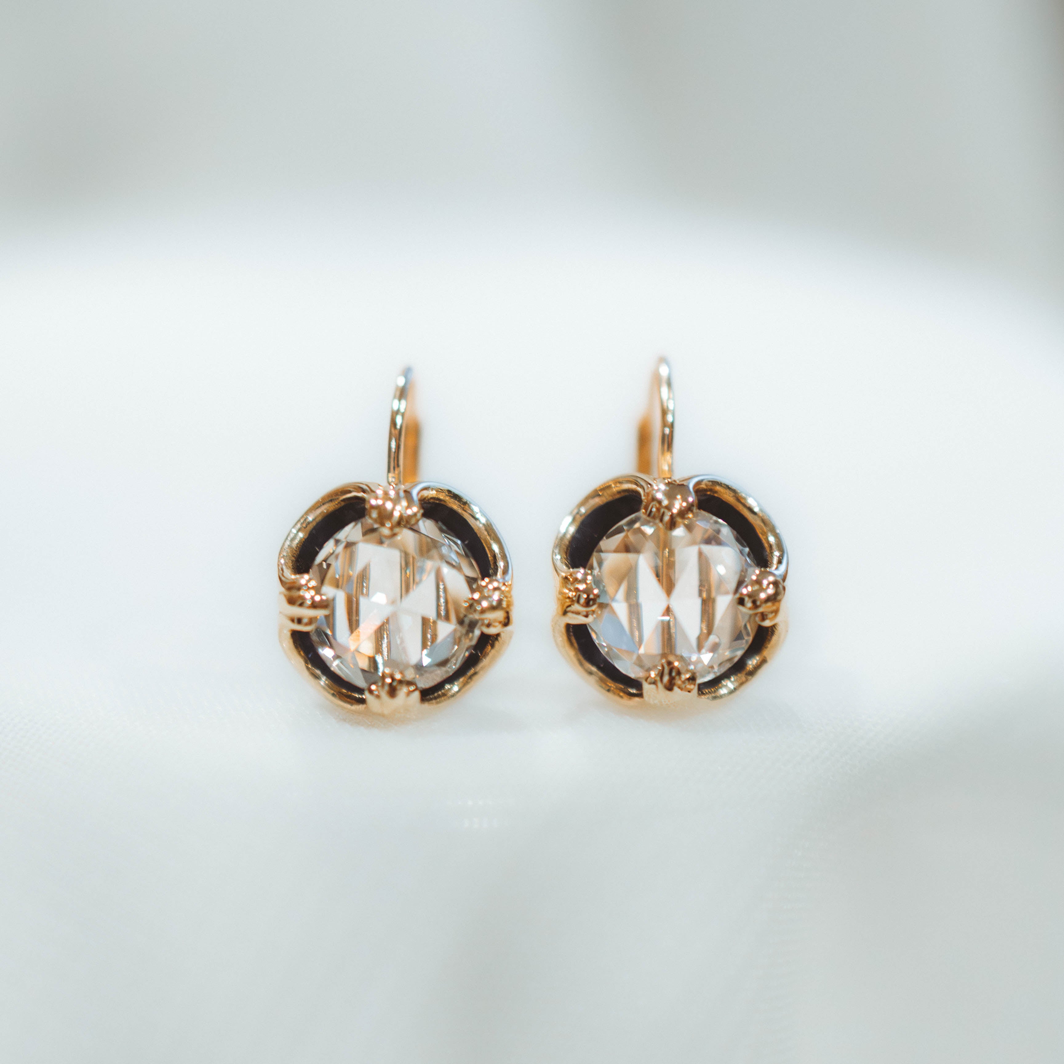 Pair of gold and blue earrings with rose cut diamonds