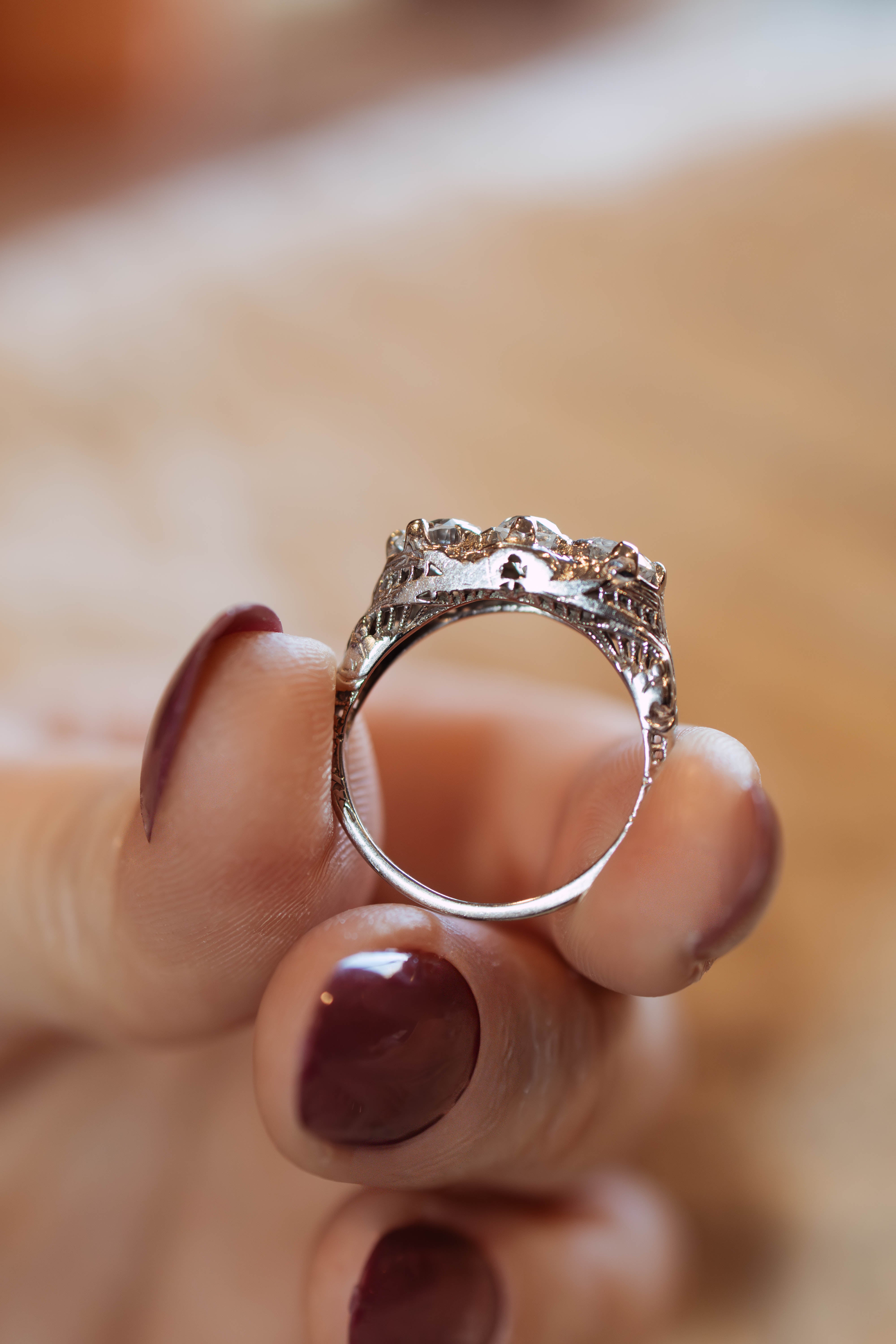 Detailed view of white gold art deco filigree basket