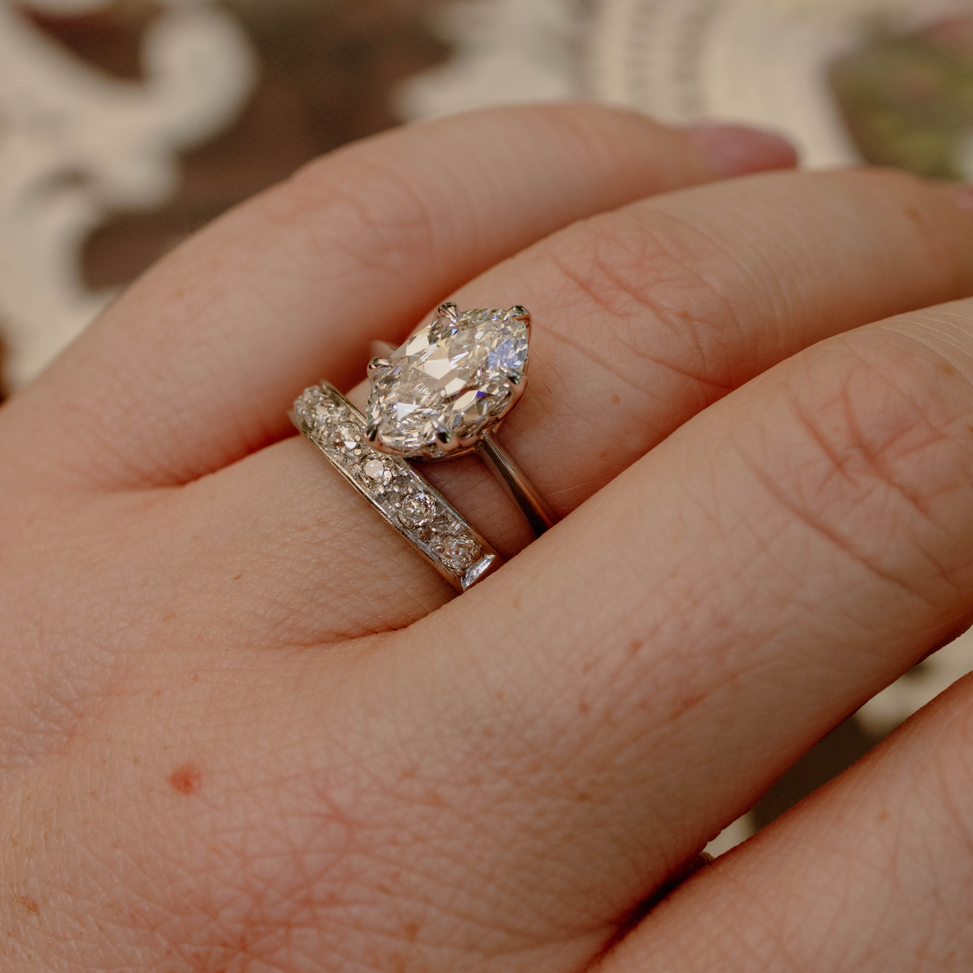 moval diamond white gold solitaire on hand with wedding band