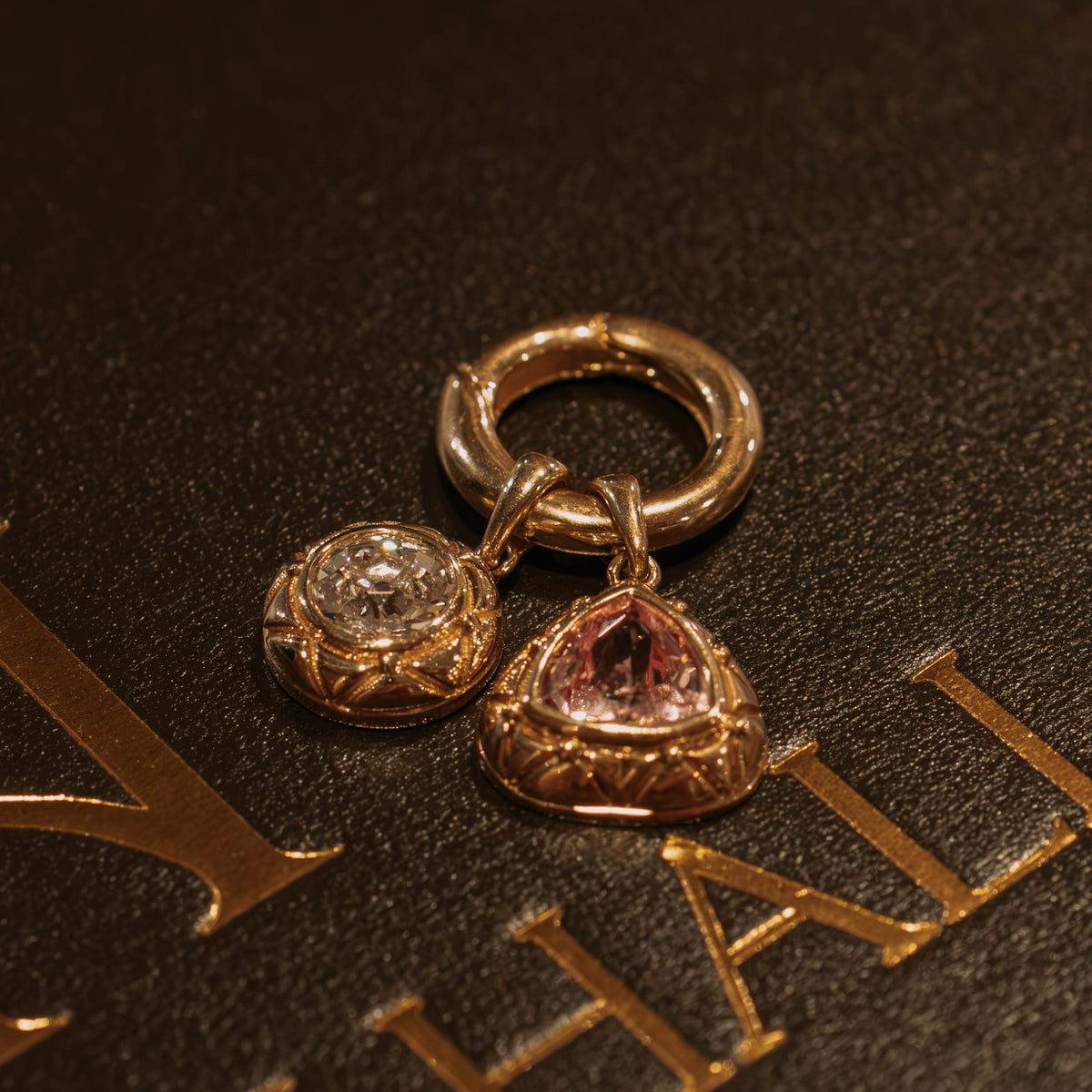 The Connector push hinge charm ring in solid 14k gold