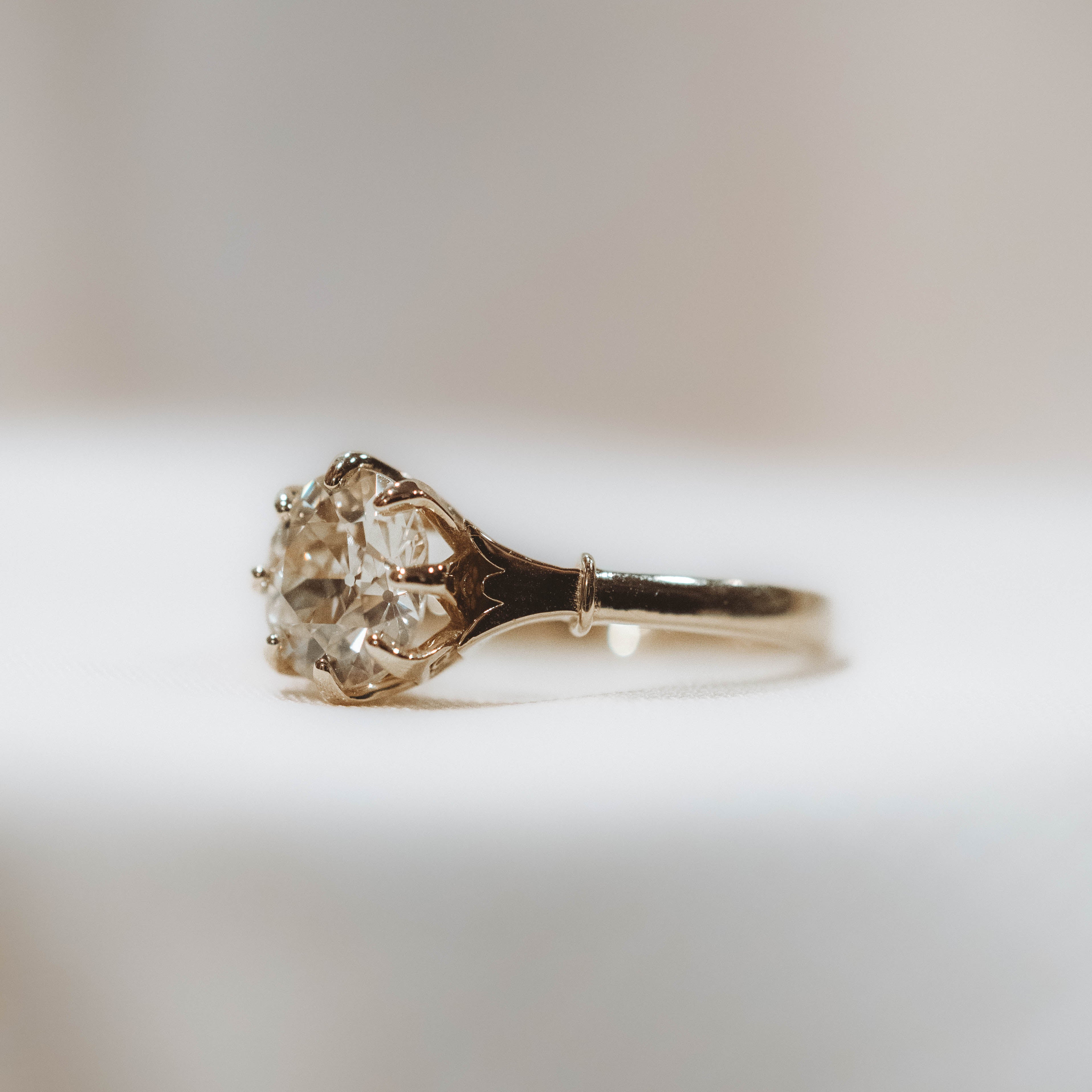 antique old european gold engagement in decorative basket