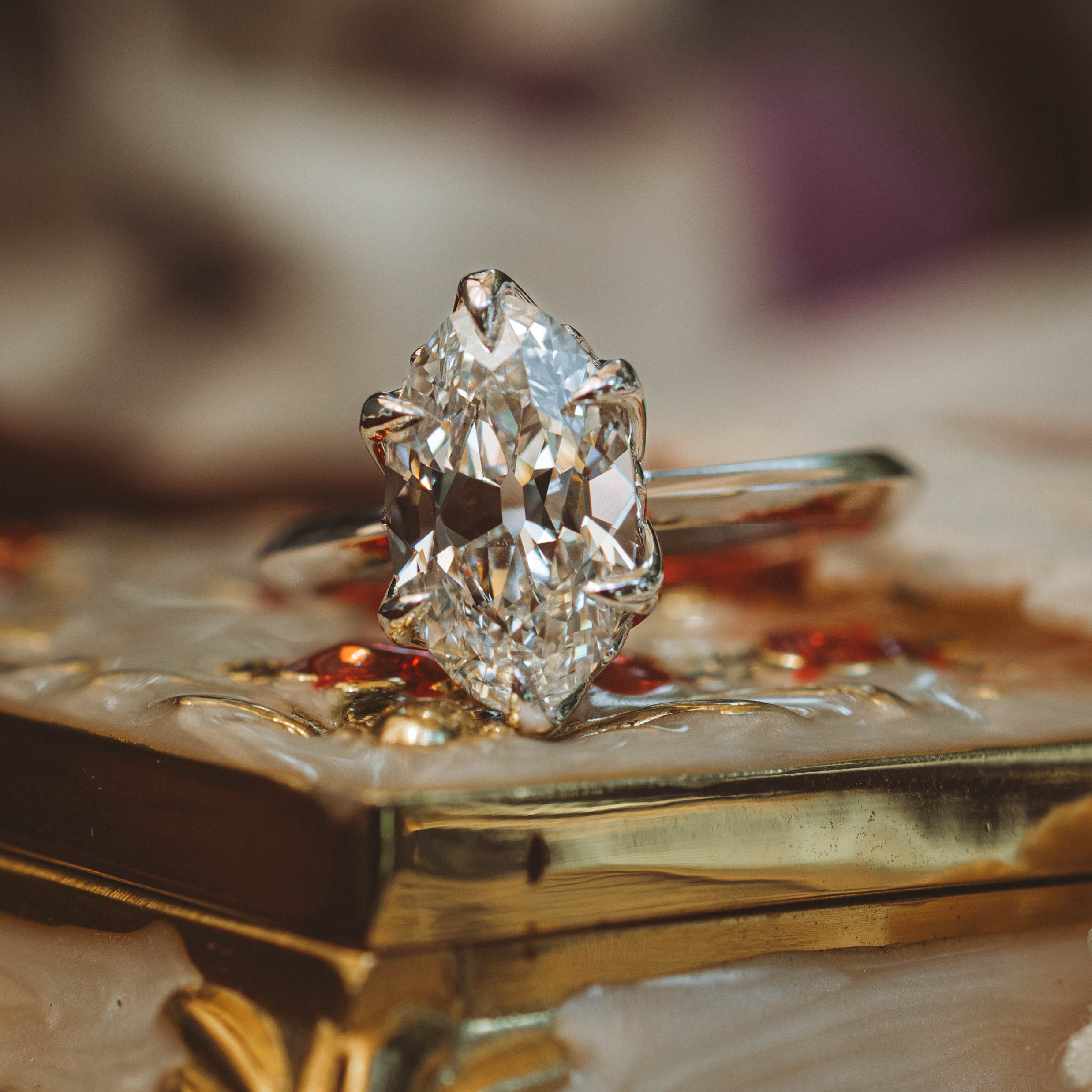 moval diamond white gold solitaire on trinket box