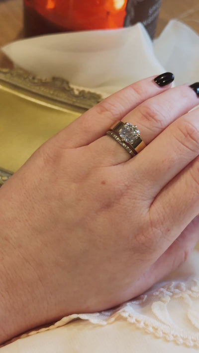 thick gold band engagement ring wtih old mine cut antique style diamond with vintage wedding band